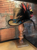 Feather embellishments are done one feather at a time.  Get your color on with this top hat.