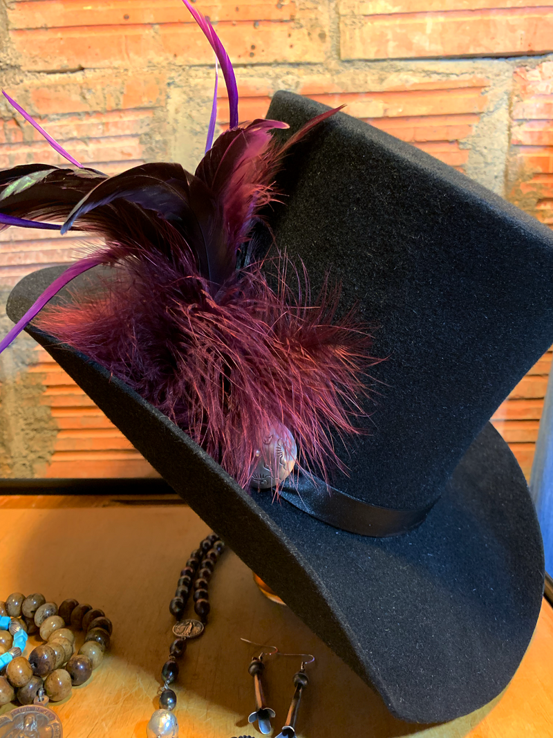 Take a walk on the wild side in the Purple Haze top hat! The perfect accessory!