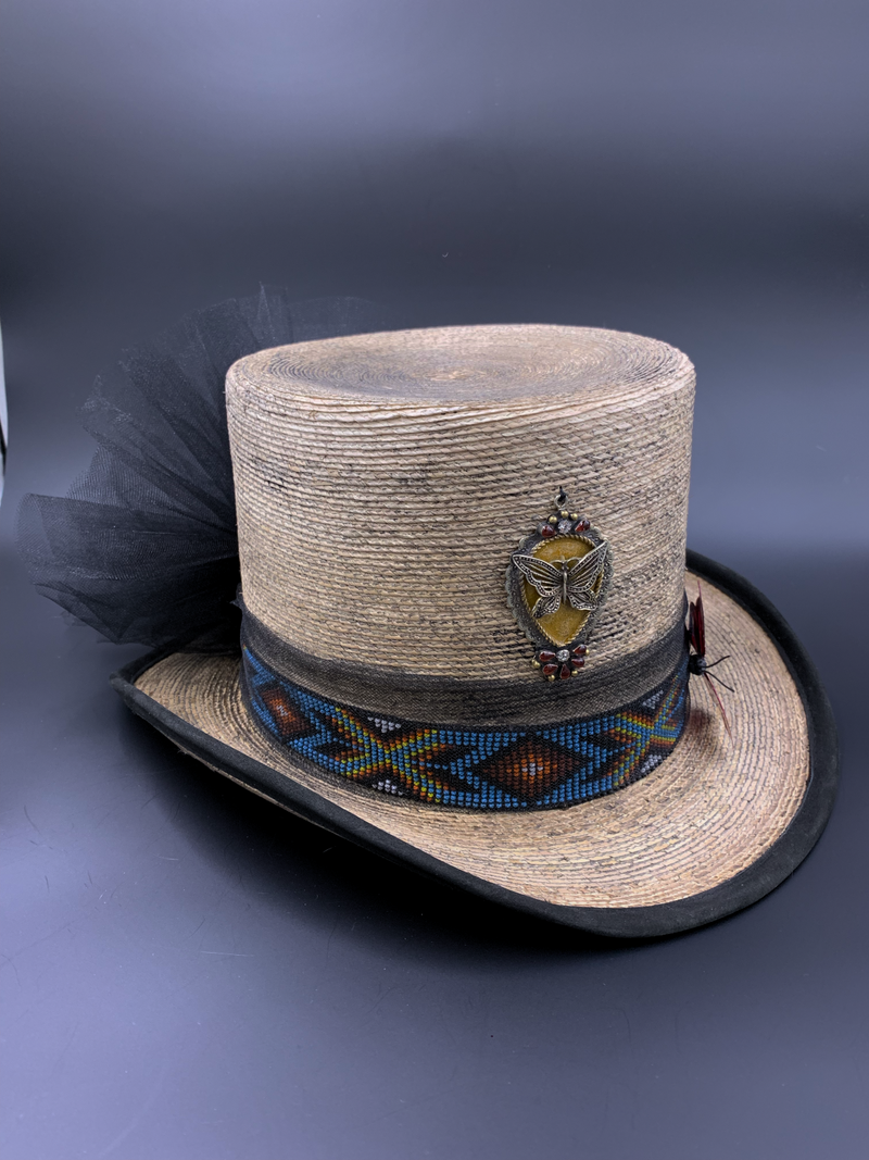 Size medium but can easily be made smaller! Get your top hat on!